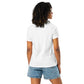 Camiseta MILLE Ink Riot de color blanco. Vista trasera con modelo de cuerpo entero.
